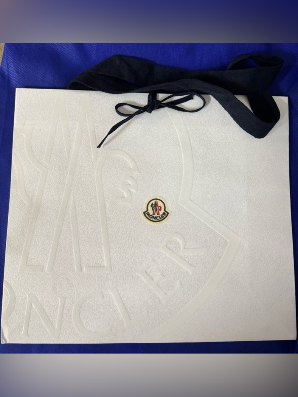 Moncler 💯% Authentic iconic shopping paper bag — Like New. Ideal for gifts